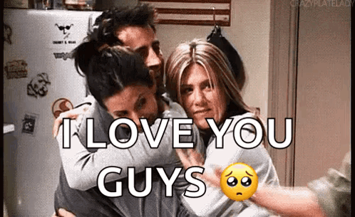 A Man And Two Women Hugging Each Other With The Words `` I Love You Guys '' . GIF