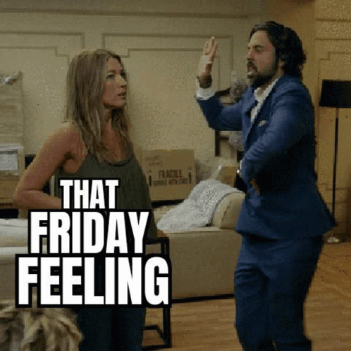 A Man And Woman Are Dancing In A Living Room . GIF