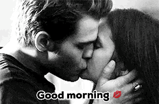 A Man And Woman Are Kissing In A Black And White Photo With The Words `` Good Morning '' . GIF