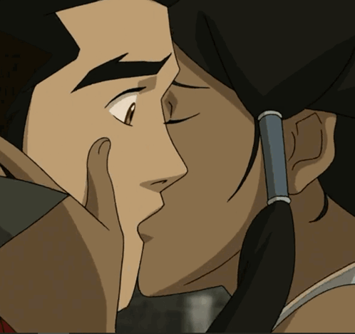 A Man And Woman Are Kissing In A Cartoon GIF