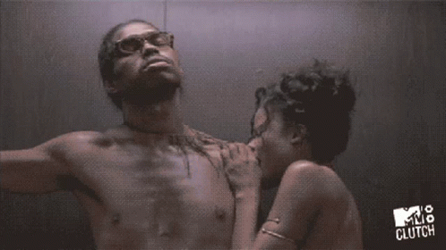 A Man And Woman Are Kissing In An Elevator With The Words Mtv Clutch On The Bottom Right GIF