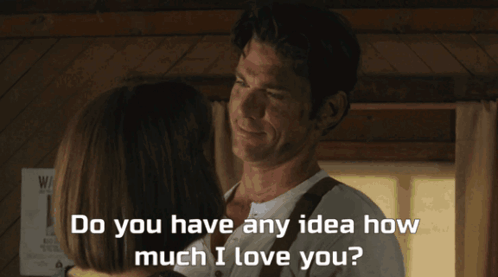 A Man And Woman Are Looking Into Each Other 'S Eyes With The Words Do You Have Any Idea How Much I Love You Below Them GIF