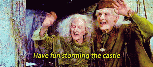 A Man And Woman Are Standing Next To Each Other With The Words `` Have Fun Storming The Castle '' Above Them . GIF