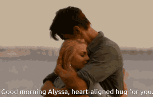 A Man And Woman Hugging With The Words " Good Morning Alyssa Heart-Aligned Hug For You " Below Them GIF