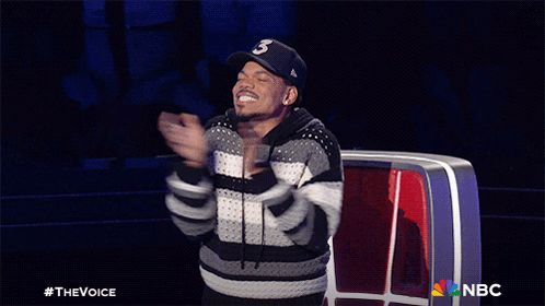 A Man Applauds While Wearing A Hat That Says ' S ' On It GIF