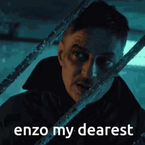 A Man Behind Bars With The Words Enzo My Dearest Written Below Him GIF