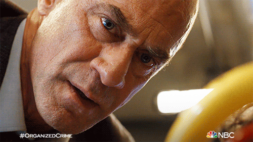 A Man Being Curious GIF