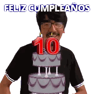 a man blowing out a candle on a cake that says 10