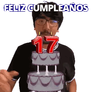 a man blowing out a candle on a cake with the number 17 on it