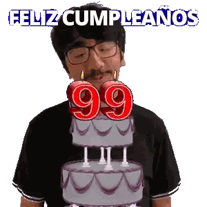 a man blowing out candles on a cake that says 99 on it
