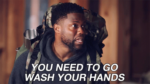 A Man Carrying A Backpack With The Words You Need To Go Wash Your Hands Above Him GIF
