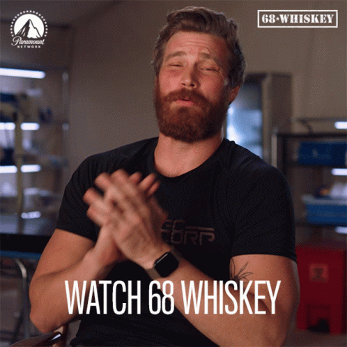 A Man Clapping With The Words Watch 68 Whiskey Written Below Him GIF