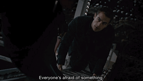 A Man Climbs A Set Of Stairs And Says Everyone 'S Afraid Of Something . GIF