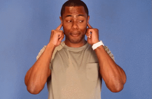 A Man Covering His Ears With His Hands And A Watch On His Wrist GIF
