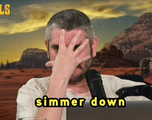 A Man Covering His Face With His Hand And The Words Simmer Down Written On The Bottom GIF