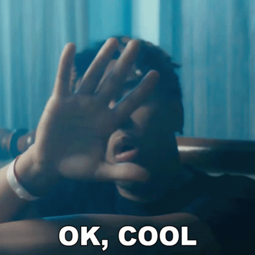 A Man Covering His Face With His Hands And The Words Ok Cool Below GIF