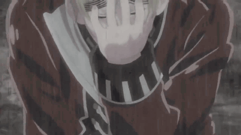 A Man Covering His Face With His Hands In A Cartoon GIF