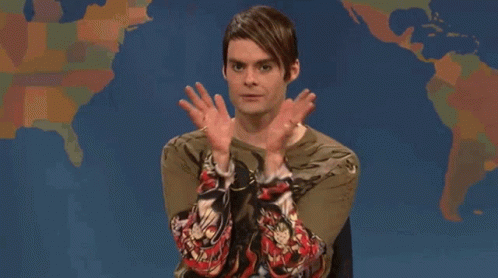 A Man Covering His Face With His Hands In Front Of A Map GIF