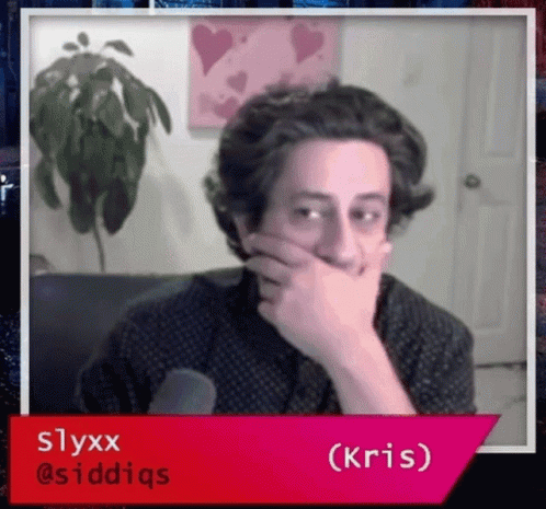 A Man Covering His Mouth With His Hand And The Name Kris On The Bottom Right GIF