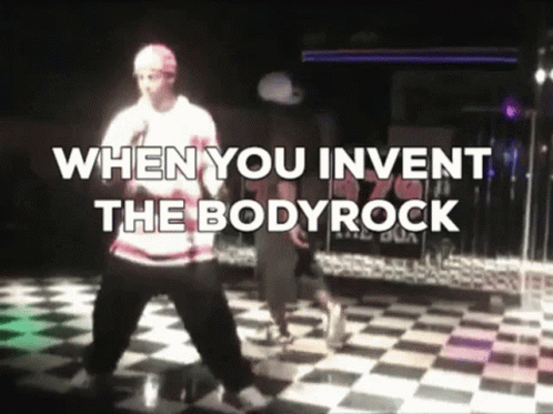 A Man Dancing On A Checkered Floor With The Words When You Invent The Bodyrock GIF