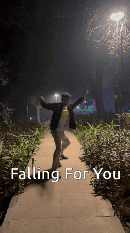 A Man Dancing On A Path With The Words Falling For You GIF
