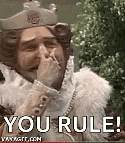 a man dressed as a king is covering his mouth with his hand and smoking a cigarette .