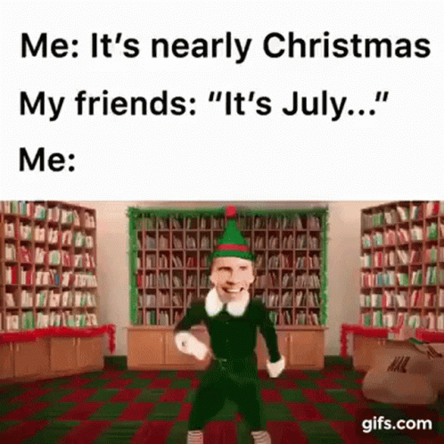A Man Dressed As An Elf Is Dancing In A Library With A Caption That Says `` It 'S July ... '' . GIF