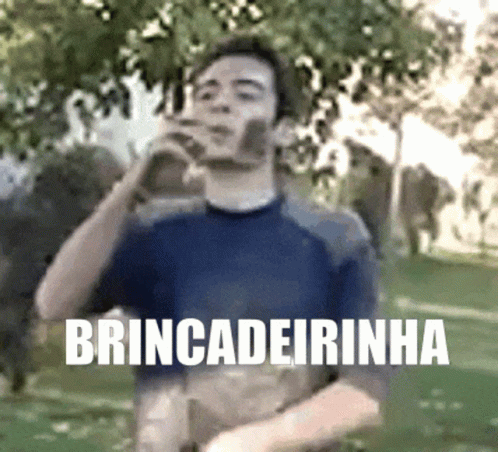 a man drinking from a bottle with the word brincadeirainha written below him
