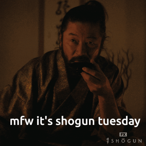 a man drinking from a cup with the words mfw it 's shogun tuesday below him