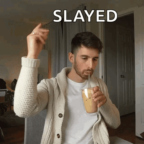 A Man Drinking Through A Straw With The Word Slayed Written Above Him GIF