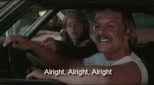 A Man Driving A Car With The Words Alright Alright Alright On The Bottom GIF