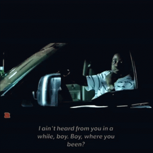 A Man Driving A Car With The Words I Ain 'T Heard From You In A While GIF