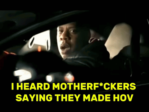 A Man Driving A Car With The Words " I Heard Motherfuckers Saying They Made Hov " Above Him GIF