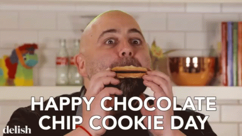 A Man Eating A Chocolate Chip Cookie With The Words Happy Chocolate Chip Cookie Day GIF