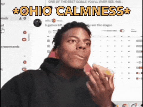 A Man Eating A Sandwich With The Words " Ohio Calmness " On The Bottom GIF