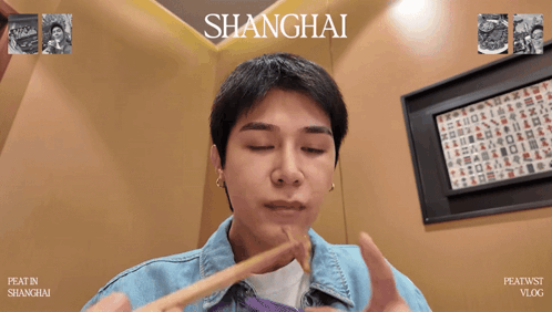 A Man Eating With Chopsticks In Shanghai GIF