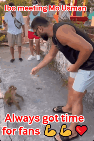 A Man Feeding A Monkey With The Caption Ibo Meeting Mo Usman Always Got Time For Fans 666 GIF