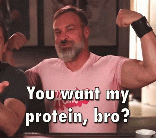 A Man Flexing His Muscles With The Words " You Want My Protein Bro " Below Him GIF