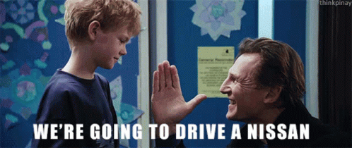 A Man Giving A Child A High Five With The Words We 'Re Going To Drive A Nissan GIF