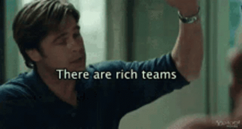 A Man Giving A High Five With The Words There Are Rich Teams GIF