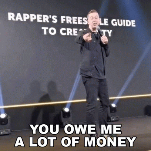 a man giving a speech with the words you owe me a lot of money