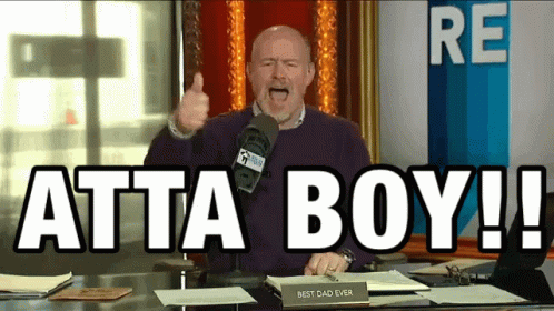 A Man Giving A Thumbs Up In Front Of A Microphone With The Words Atta Boy Written On The Screen GIF