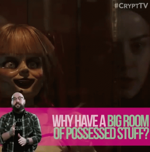 A Man Giving A Thumbs Up In Front Of A Poster That Says " Why Have A Big Room Of Possessed Stuff " GIF