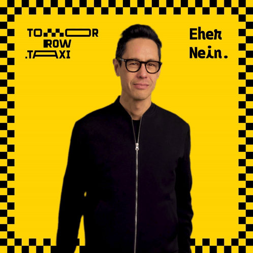 A Man Giving A Thumbs Up In Front Of A Yellow And Black Checkered Background With Tomorrow Row Taxi Written On It GIF