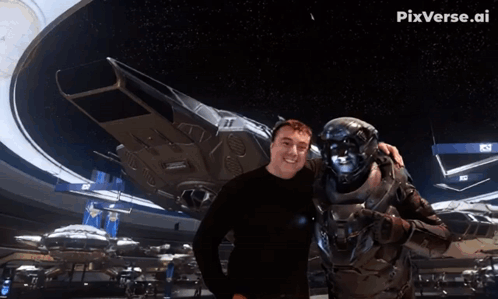a man giving a thumbs up next to a robot with pix written on the bottom