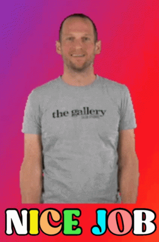 A Man Giving A Thumbs Up Wearing A Shirt That Says The Gallery GIF