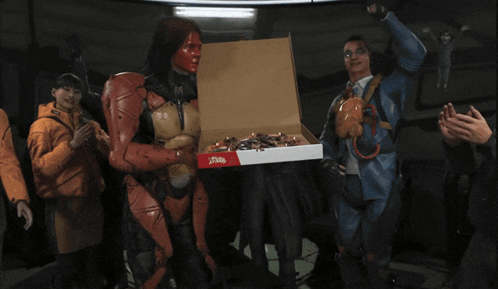 A Man Giving A Thumbs Up While Holding A Pizza Box GIF