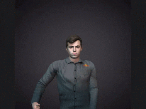 A Man Giving A Thumbs Up With The Letter Gg Behind Him GIF