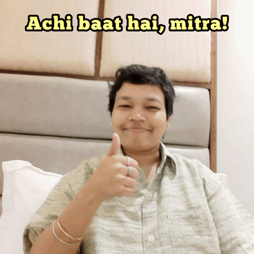 A Man Giving A Thumbs Up With The Words Achi Baat Hai Mitra Behind Him GIF