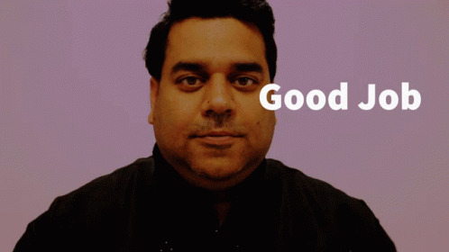 A Man Giving A Thumbs Up With The Words Good Job Behind Him GIF